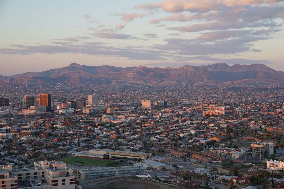 Just beyond the tall buildings of downtown El Paso, Texas, is Ju&aacute;rez Mexico and the Sierra Madre mountain range. (Photo: Laura Bassett)