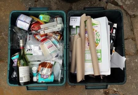 Domestic waste that has been sorted into plastics, glass, metals and card is left outside to be recycled in London, Britain August 14, 2017. REUTERS/Russell Boyce