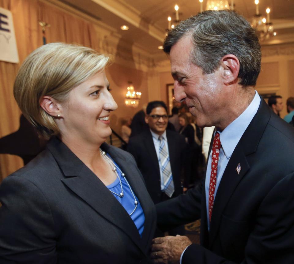 Brenda Mayrack receives condolences from then-Congressman John Carney after losing a race for state auditor in 2014. Mayrack was appointed Delaware State Escheator and Director of the Office of Unclaimed Property in 2018.