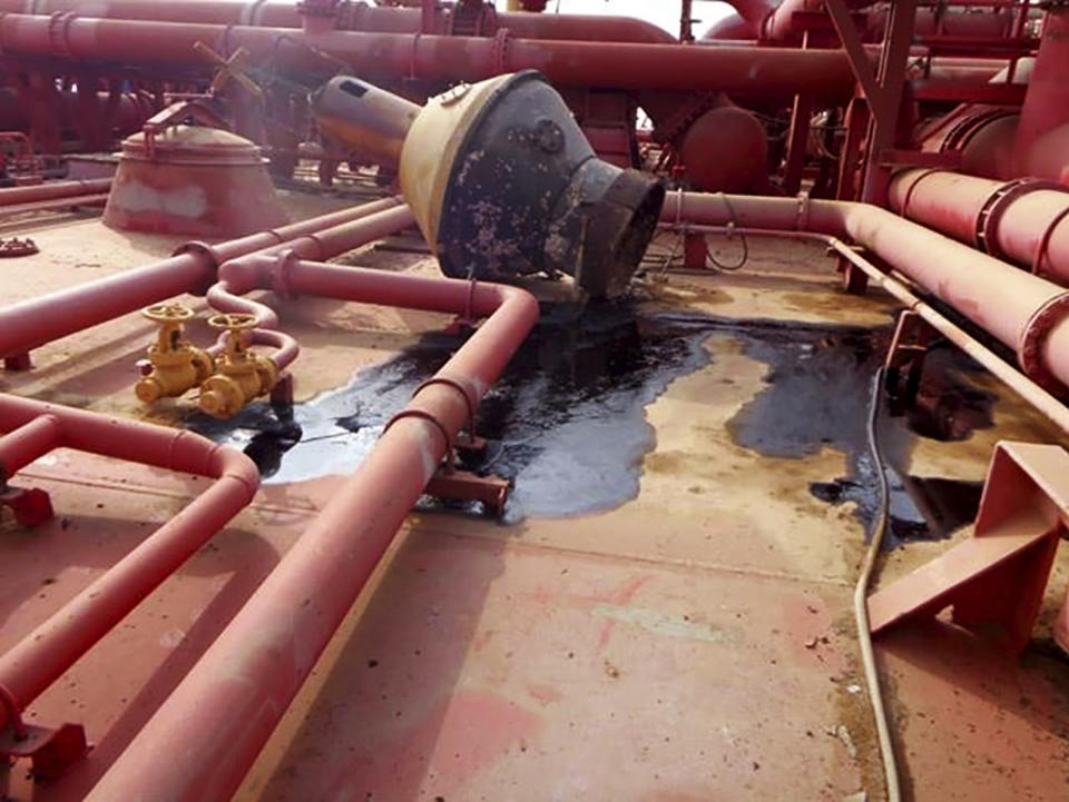 This image provided by I.R. Consilium taken in 2019, shows the deck of the FSO Safer, indicating the lack of basic maintenance for several years, leading to incidental smaller spills, moored off Ras Issa port, Yemen. Houthi rebels are blocking the United Nations from inspecting the abandoned oil tanker loaded with more than one million barrels of crude oil. UN officials and experts fear the tanker could explode or leak, causing massive environmental damage to Red Sea marine life. (I.R. Consilium via AP)