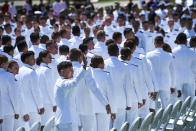 The 250 graduating cadets enter the field to cheers and applause at the start of the U.S. Coast Guard Academy's 141st Commencement Exercises, Wednesday, May 18, 2022, in New London, Conn. (AP Photo/Stephen Dunn). (AP Photo/Stephen Dunn)