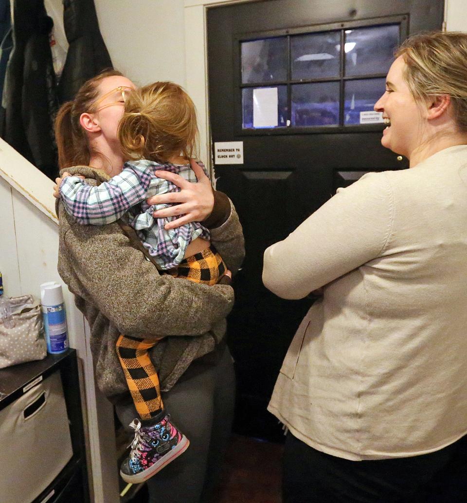 A mother staying at Hope on Haven Hill hugs her daughter during the child's visit while her mom is active in the program.