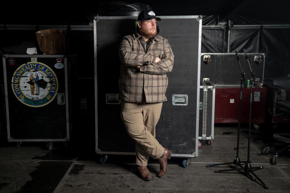 Luke Combs poses for a portrait on the stage at Empower Field at Mile High in Denver, Colo., Friday, May 20, 2022.