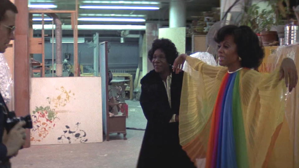 Diana Ross poses in a rainbow colored dress in Mahogany.