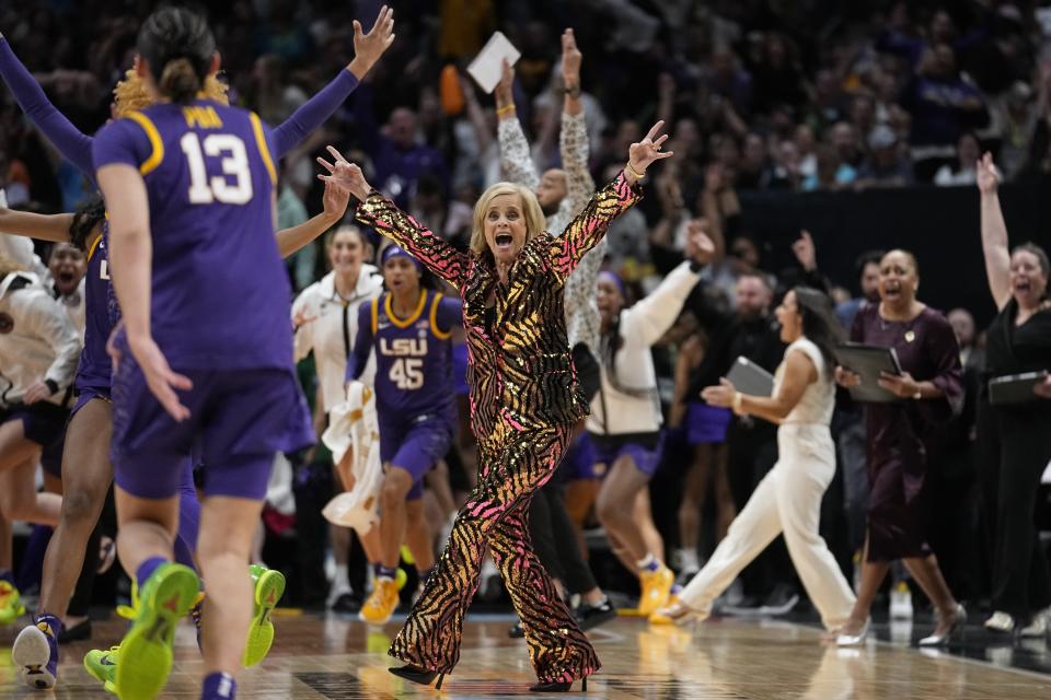 LSU head coach Kim Mulkey reacts to a final second shot during the first half of the NCAA Women's Final Four championship basketball game against Iowa Sunday, April 2, 2023, in Dallas. (AP Photo/Tony Gutierrez)