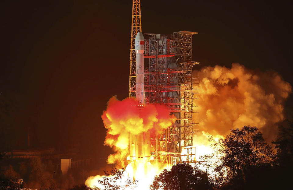 In this photo released by Xinhua News Agency, the Chang'e 4 lunar probe launches from the the Xichang Satellite Launch Center in southwest China's Sichuan Province, Saturday, Dec. 8, 2018. China launched a ground-breaking mission Saturday to soft-land a spacecraft on the largely unexplored far side of the moon, demonstrating its growing ambitions as a space power to rival Russia, the European Union and U.S. (Jiang Hongjing/Xinhua via AP)