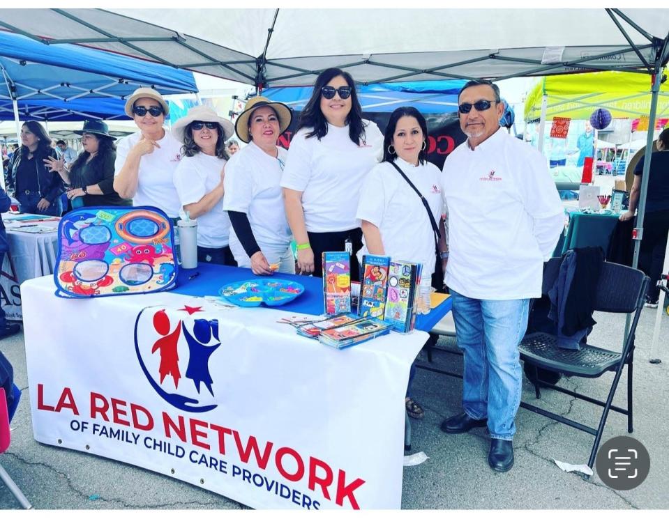 Rosa Bobadilla, third from right, and other members of the La Red Network of Family Child Care Providers, which advocates for home child care providers in the eastern Coachella Valley.
