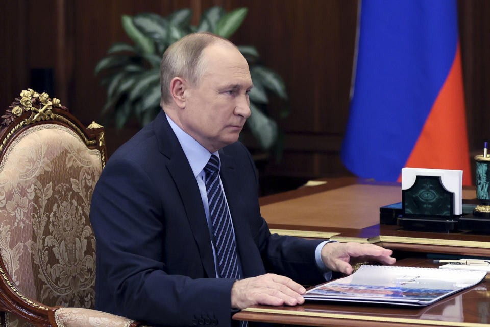 Russian President Vladimir Putin listens during a meeting in the Kremlin in Moscow, Russia, Thursday, Jan. 13, 2022. (Mikhail Metzel, Sputnik, Kremlin Pool Photo via AP)