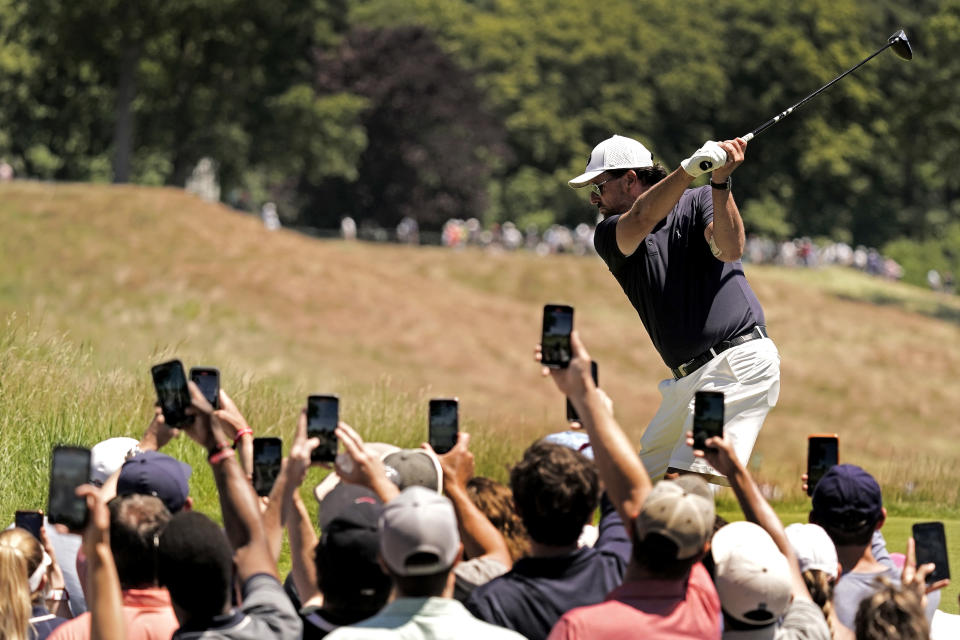 Phil Mickelson takes a tee shot on the fifth hole during a practice round ahead of the U.S. Open golf tournament, Tuesday, June 14, 2022, at The Country Club in Brookline, Mass. (AP Photo/Charlie Riedel)