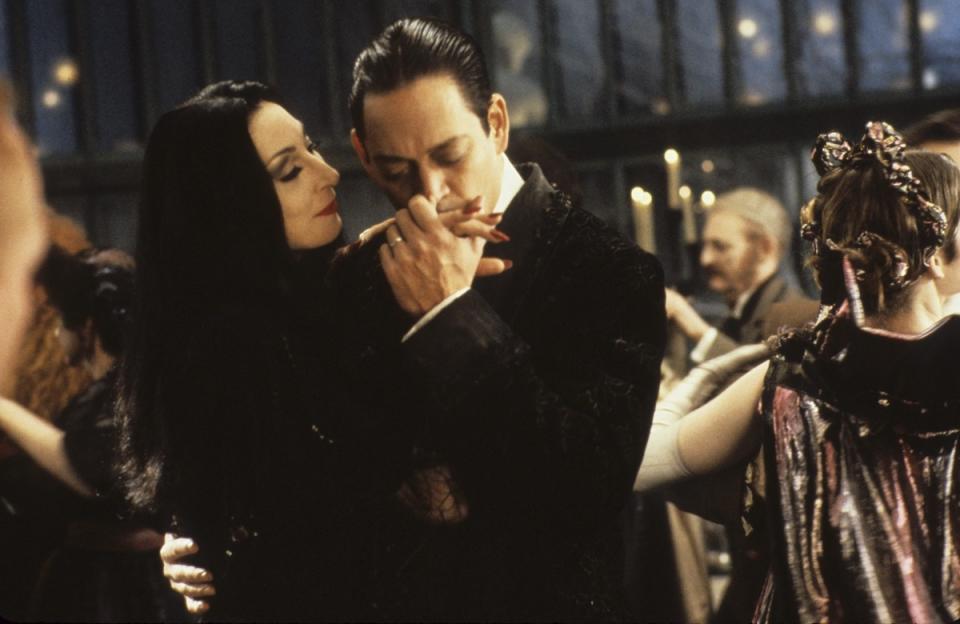 Anjelica Huston and Raul Julia in 'The Addams Family,' 1991