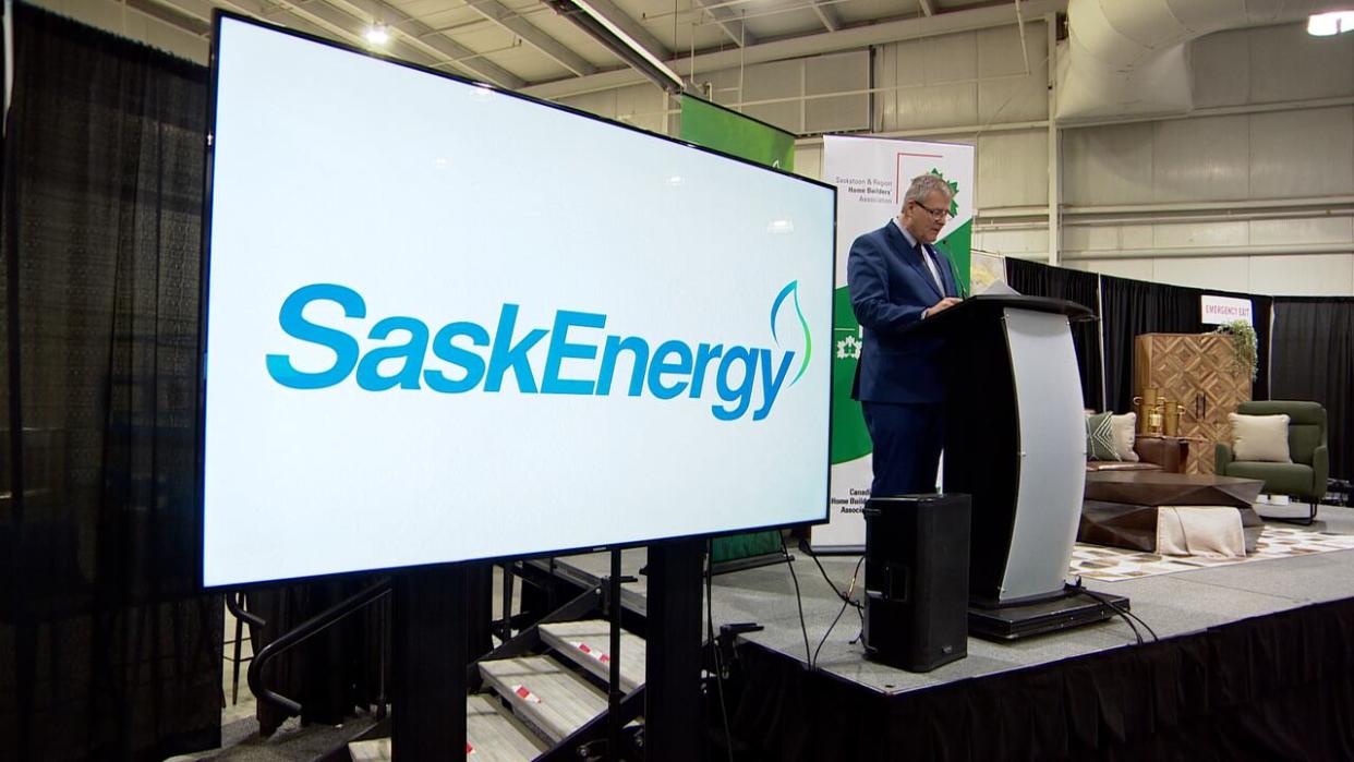 MLA David Buckingham speaks at the launch of SaskEnergy's Homes Beyond Code Program at the Saskatoon HomeStyles Show at Prairieland Park on Friday.  (CBC News - image credit)