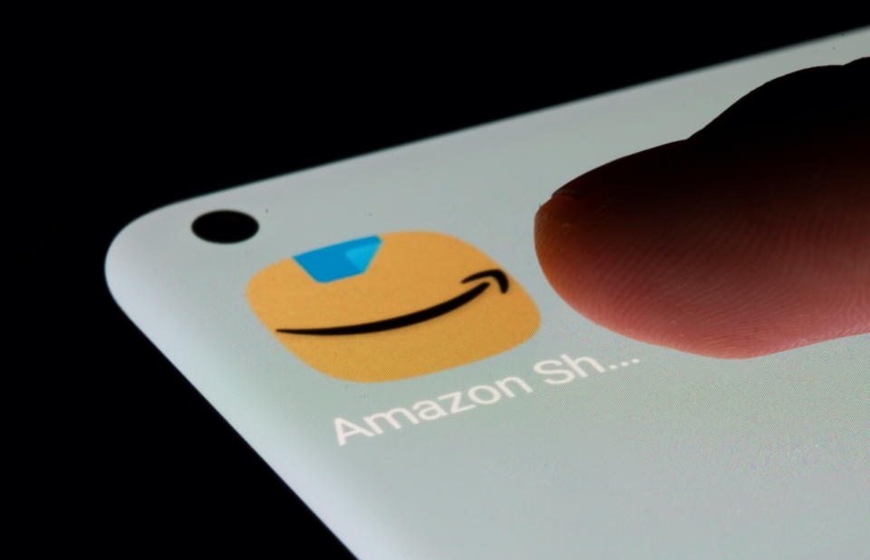 Amazon app is seen on a smartphone in this illustration taken, July 13, 2021. REUTERS/Dado Ruvic/Illustration - RC2TJO9F74TM