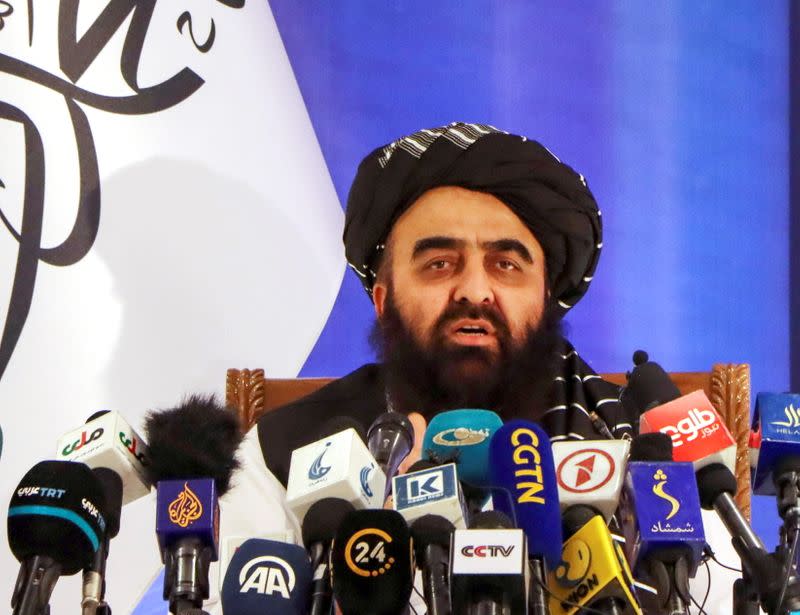 Taliban acting Foreign Minister Amir Khan Muttaqi speaks during a news conference in Kabul