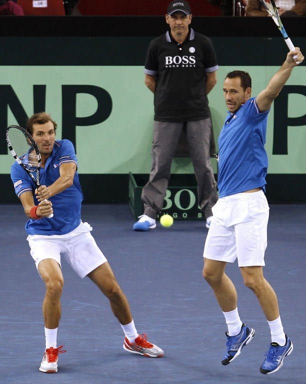France's Julien Benneteau (L) and Michael Llodra during their Davis Cup match against Israel on February 2, 2013. The French duo won 7-6 (7/3), 6-1, 6-0 in the doubles to cement an insurmountable 3-0 lead in the tie