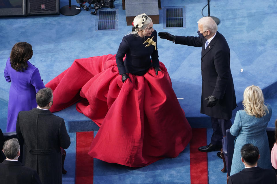 President-elect Joe Biden greets Lady Gaga during the 59th Presidential Inauguration at the U.S. Capitol in Washington, Wednesday, Jan. 20, 2021.