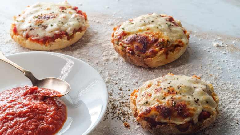 English muffin pizzas with sauce