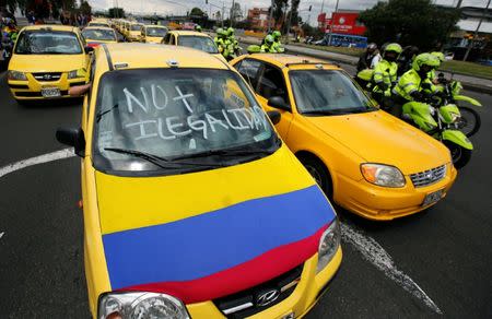 Taxi drivers protest against Uber in Bogota, Colombia, October 23, 2017. REUTERS/Jaime Saldarriaga