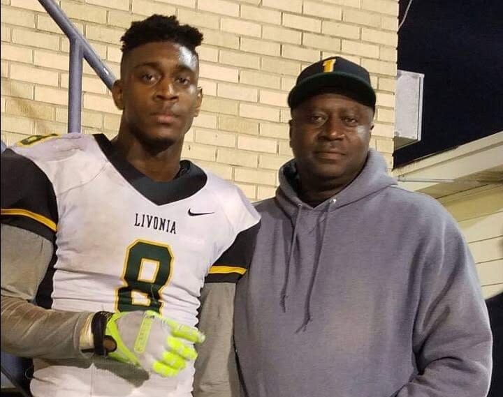 Dwayne Queen put his son Patrick, left, through rigorous workouts as a child. They paid off in a football scholarship to LSU. (Via the Queen family)