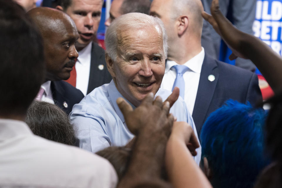 President Joe Biden greets supporters during a rally for the Democratic National Committee at Richard Montgomery High School, Thursday, Aug. 25, 2022, in Rockville, Md. (AP Photo/Alex Brandon)