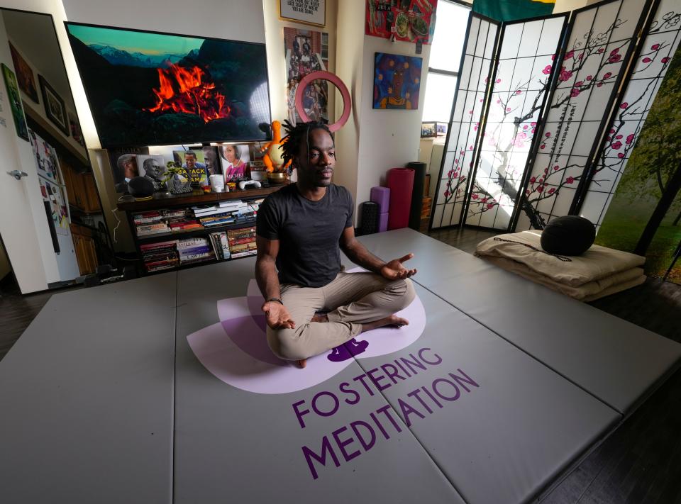 Demetrius Napolitano in his Harlem, N.Y. apartment. Demetrius Napolitano was 5 when he moved into what would become his adoptive home. He told USA TODAY he was removed from that home at 13 amid allegations of abuse. Hurting, angry, the New York teen cycled through 25 foster care placements and five high schools until he aged out of the system.  Now 27 years-old, Napolitano is launching 'Fostering Meditation,' a nonprofit organization to help youth in foster care heal from past trauma and adverse life experiences