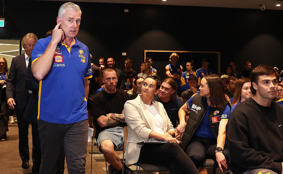 Bailey Williams, Harley Reid and Daisy Pearce look on after the Adam Simpson exchange.