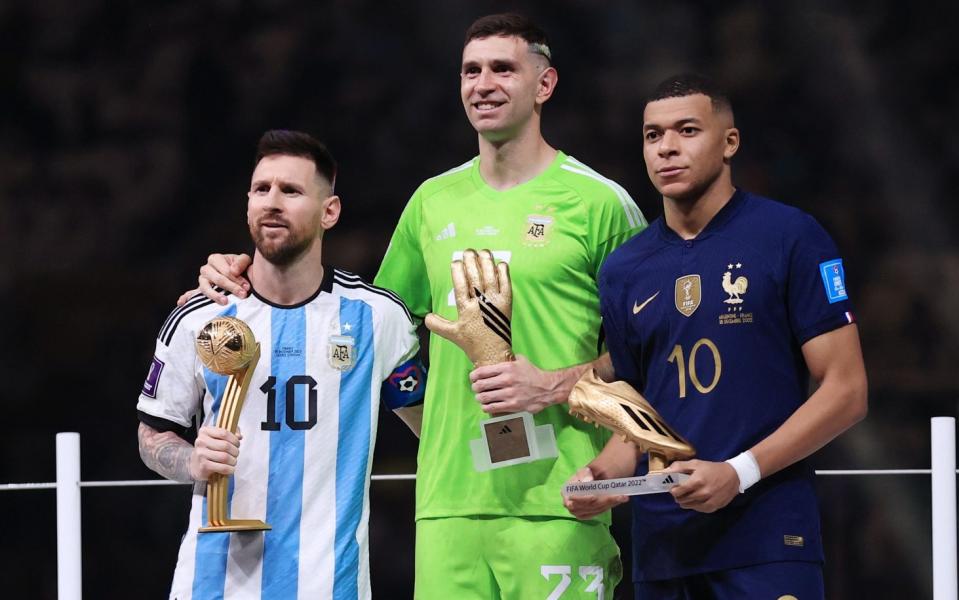 Emiliano Martinez reignites Kylian Mbappe feud with baby doll taunt next to Lionel Messi - GETTY IMAGES