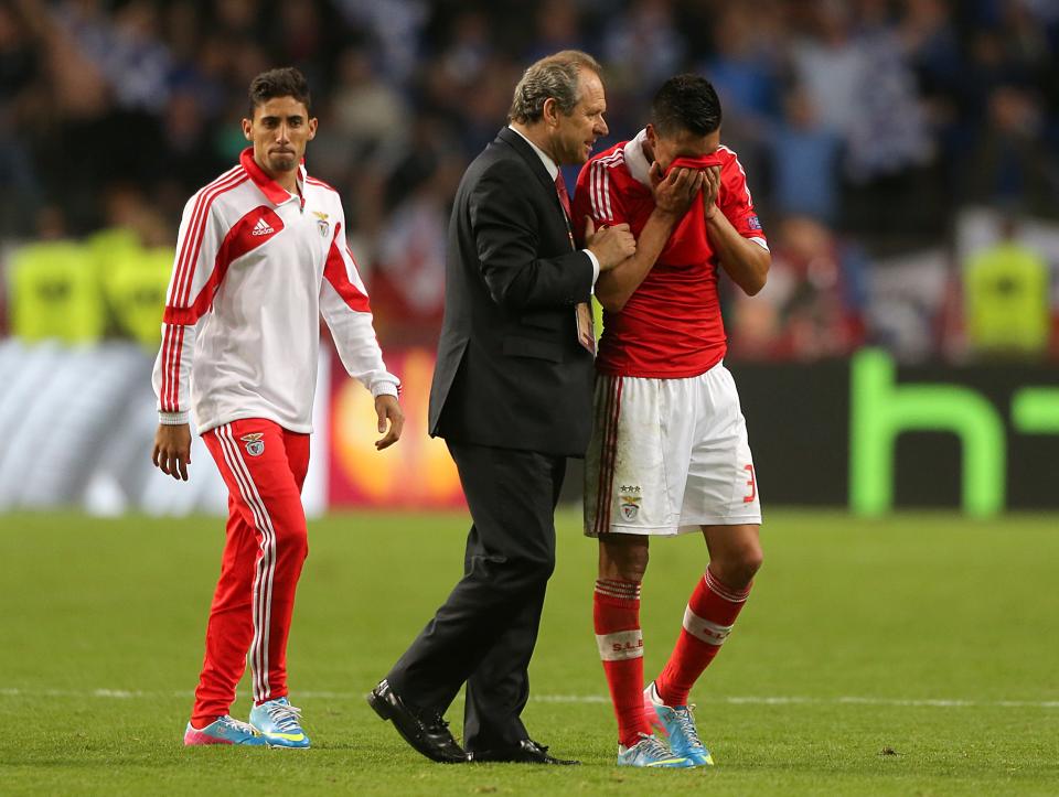 Benfica's Enzo Perez (right) looks dejected after the game