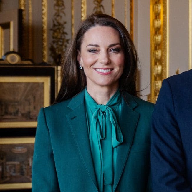 The Princess of Wales wore an emerald pussy-bow blouse to promote eco-friendly trade with Norway - Getty