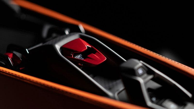 A photo of the start button on the Lamborghini Revuelto. 