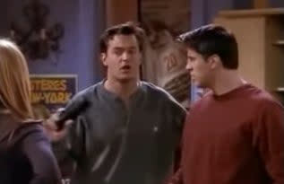 Chandler and Joey talking to Rachel in "Friends"