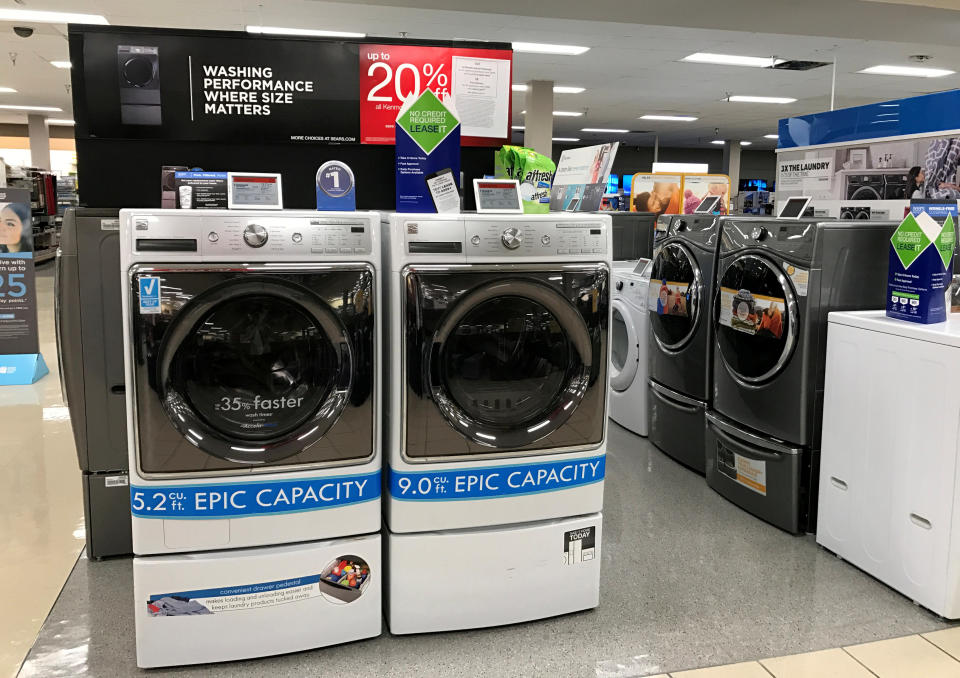 FILE PHOTO: Sears Kenmore washing machines are shown for sale inside a Sears department store in La Jolla, California, U.S., March 22, 2017. REUTERS/Mike Blake/File Photo