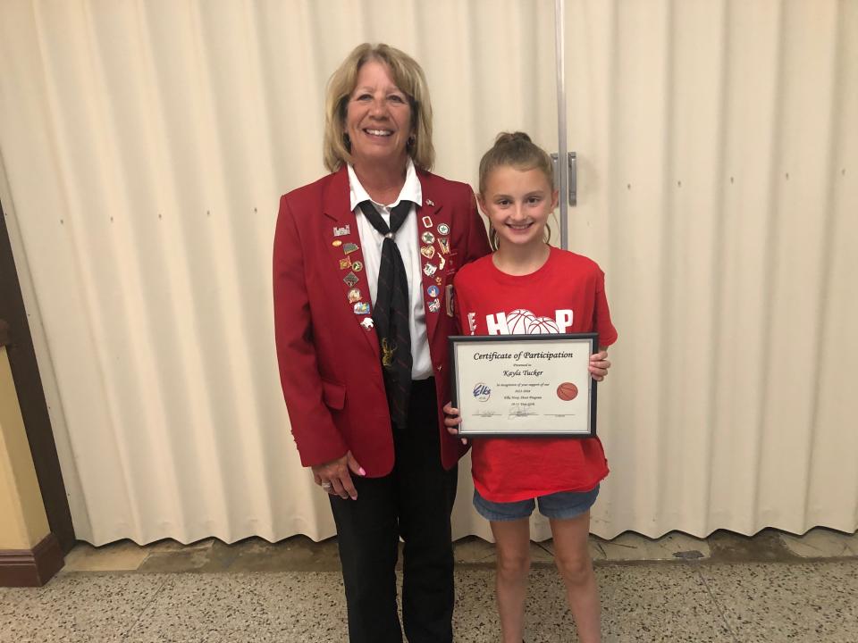 Kayla Tucker, right, was one of the winners in the recent Alliance Elks Lodge 467 Hoop Shoot event.