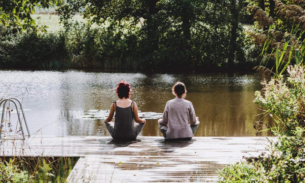 <span>Meditation by the lake at 42 Acres near Frome.</span><span>Photograph: Stephanie Braconnier</span>