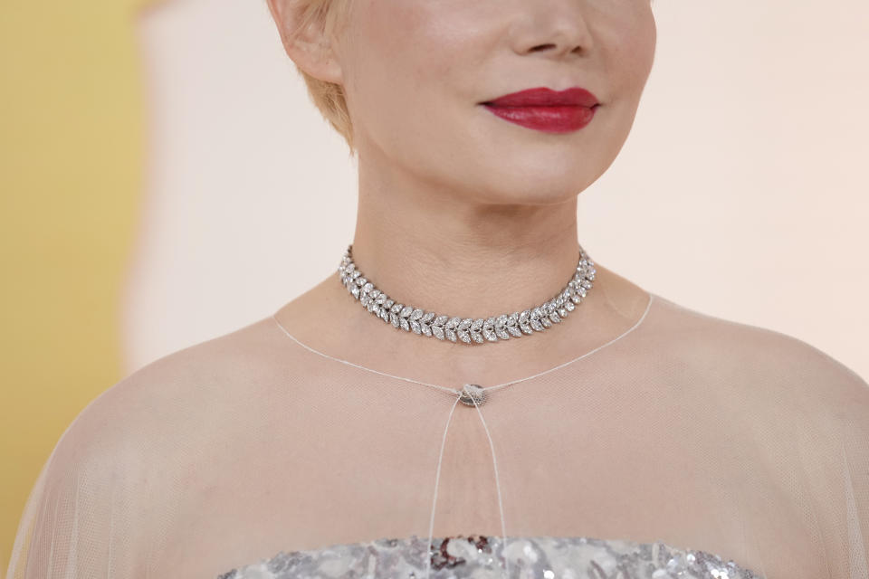 Michelle Williams arrives at the Oscars on Sunday, March 12, 2023, at the Dolby Theatre in Los Angeles. (AP Photo/Ashley Landis)