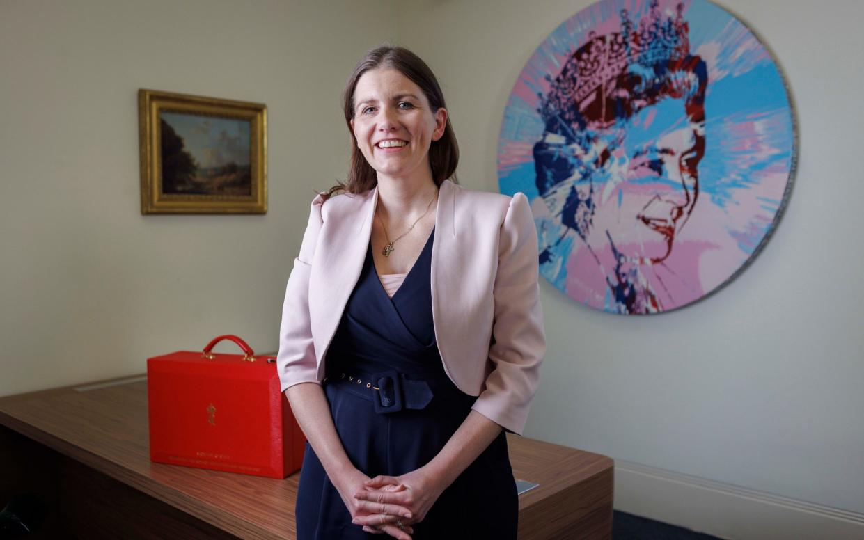 Michelle Donelan, former Secretary of State for Education, in her office with Damien Hirst's Beautiful Portrait ('The Queen')