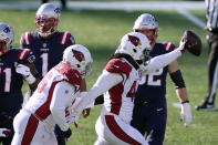 Arizona Cardinals linebacker Markus Golden, right, celebrates his interception of a pass by New England Patriots quarterback Cam Newton, left, in the first half of an NFL football game, Sunday, Nov. 29, 2020, in Foxborough, Mass. (AP Photo/Elise Amendola)