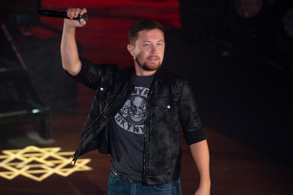 Scotty McCreery performs at the Ryman Auditorium Friday, Sept. 4, 2020 in Nashville, Tenn. It marked the first live audience at the venue since March 13, when the historic auditorium paused all public concerts due to the coronavirus pandemic.