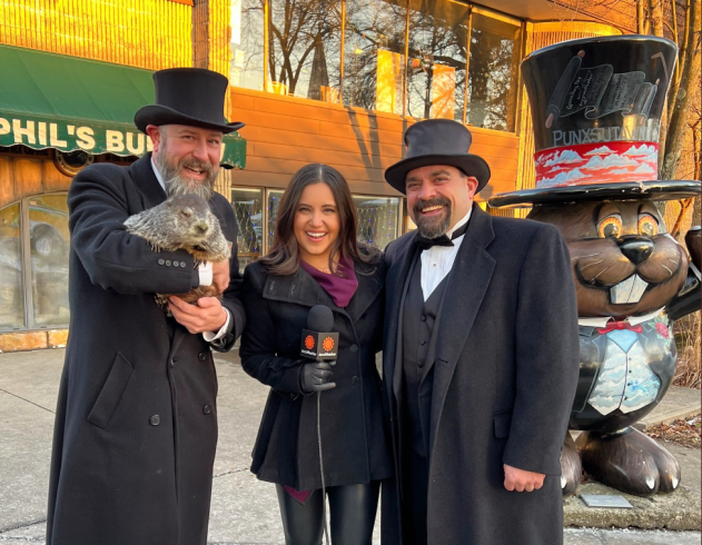 AccuWeather Senior On-Air Meteorologist Kristina Shalhoup meets Punxsutawney Phil and his handler on Wednesday, Feb. 1, 2023.