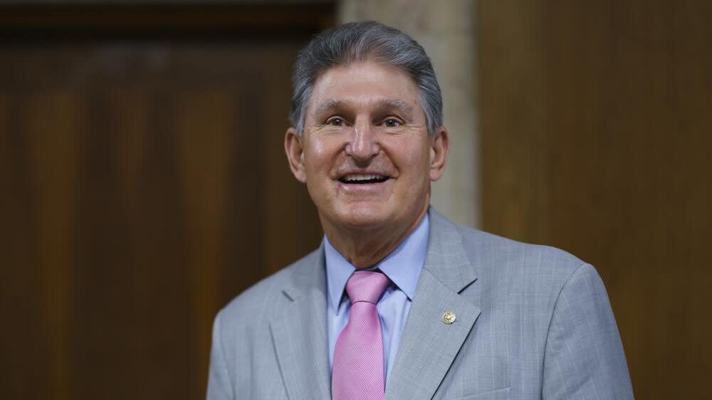 Sen. Joe Manchin, D-W.Va., chair of the Senate Energy and Natural Resources Committee, arrives to hold a confirmation hearing for Tommy Beaudreau of Alaska, to be deputy secretary of the Department of the Interior, at the Capitol in Washington, Thursday, April 29, 2021. (AP Photo/J. Scott Applewhite)