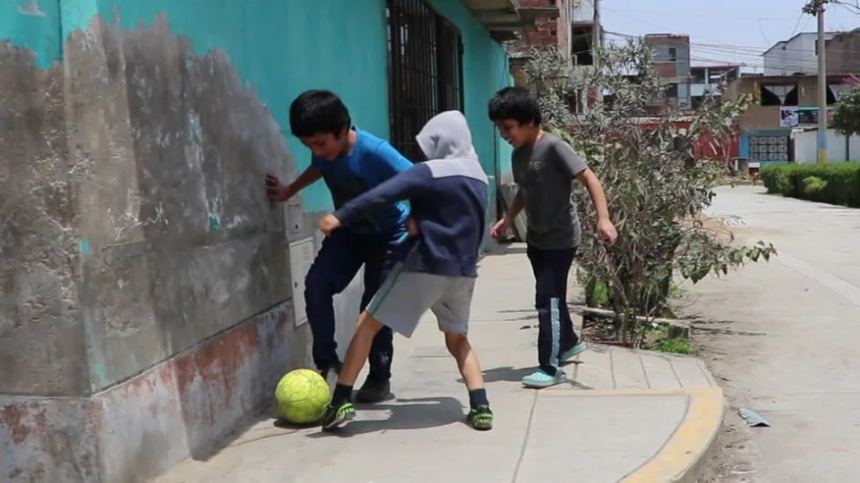 Boys playing football