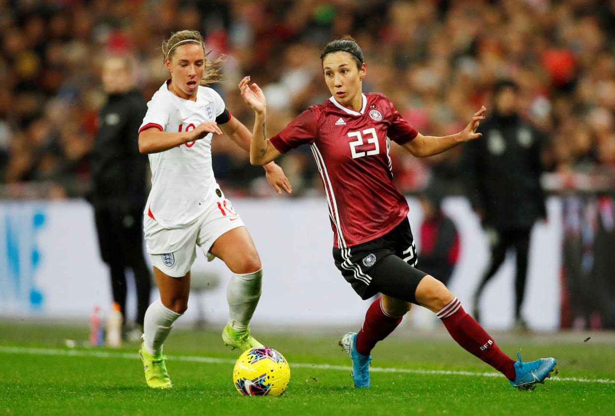 Soccer Football - Women's International Friendly - England v Germany - Wembley Stadium, London, Britain - November 9, 2019  Germany's Sara Doorsoun in action with England's Jordan Nobbs   Action Images via Reuters/Andrew Boyers