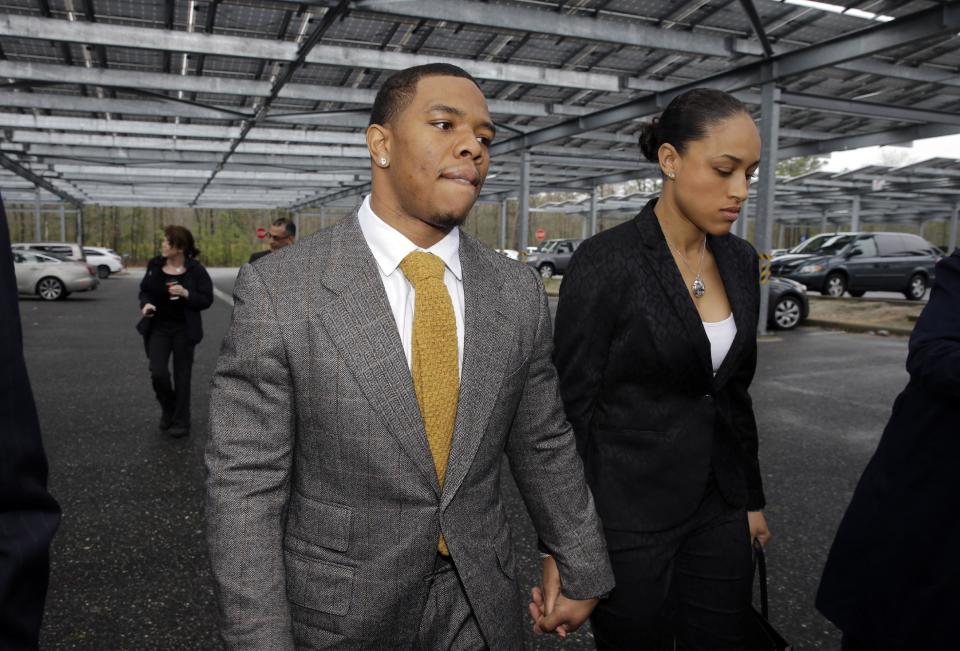 Baltimore Ravens football player and former Rutgers University standout, Ray Rice holds hands with his wife Janay Palmer as they arrive at Atlantic County Criminal Courthouse in Mays Landing, N.J., Thursday, May 1, 2014. After Rice and Janay Palmer got into a physical altercation on Feb. 15 at an Atlantic City casino, both were charged with simple assault-domestic violence. (AP Photo/Mel Evans)