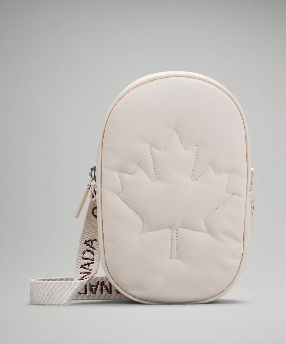 Future Legacy Crossbody Bag in white with maple leaf logo (Photo via Lululemon)