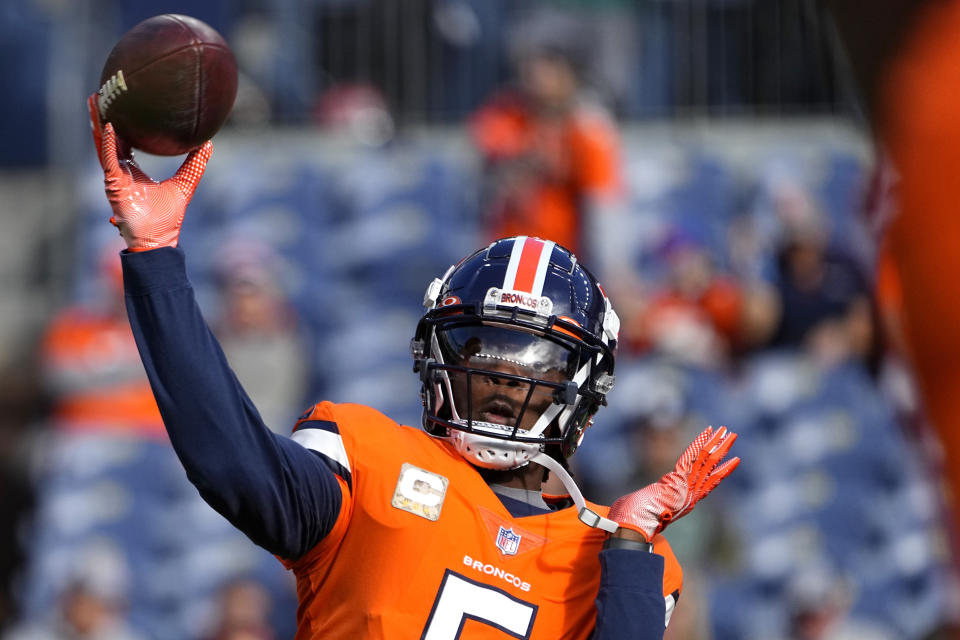 Denver Broncos quarterback Teddy Bridgewater (5) warms up prior to an NFL football game against the Philadelphia Eagles, Sunday, Nov. 14, 2021, in Denver. (AP Photo/Jack Dempsey)