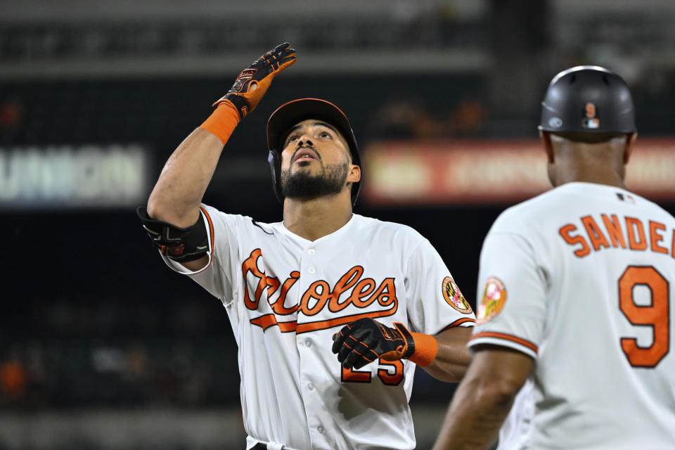 Baltimore Orioles' Anthony Santander gestures after hitting a single against Toronto Blue Jays starting pitcher Alek Manoah during the fifth inning of a baseball game, Tuesday, Aug. 9, 2022, in Baltimore. (AP Photo/Terrance Williams)