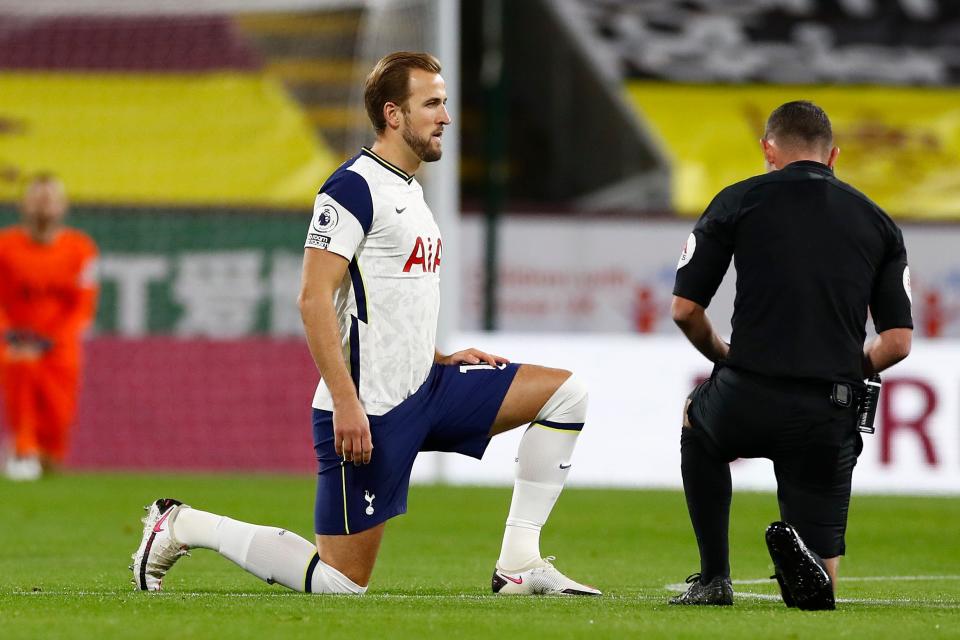 Harry Kane believes it is important for players to continue to take a knee before Premier League matches (EPA)