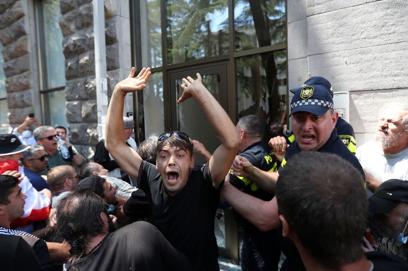 Protesters storm the office of LGBT+ campaigners ahead of the planned March for Dignity during Pride Week in Tbilisi