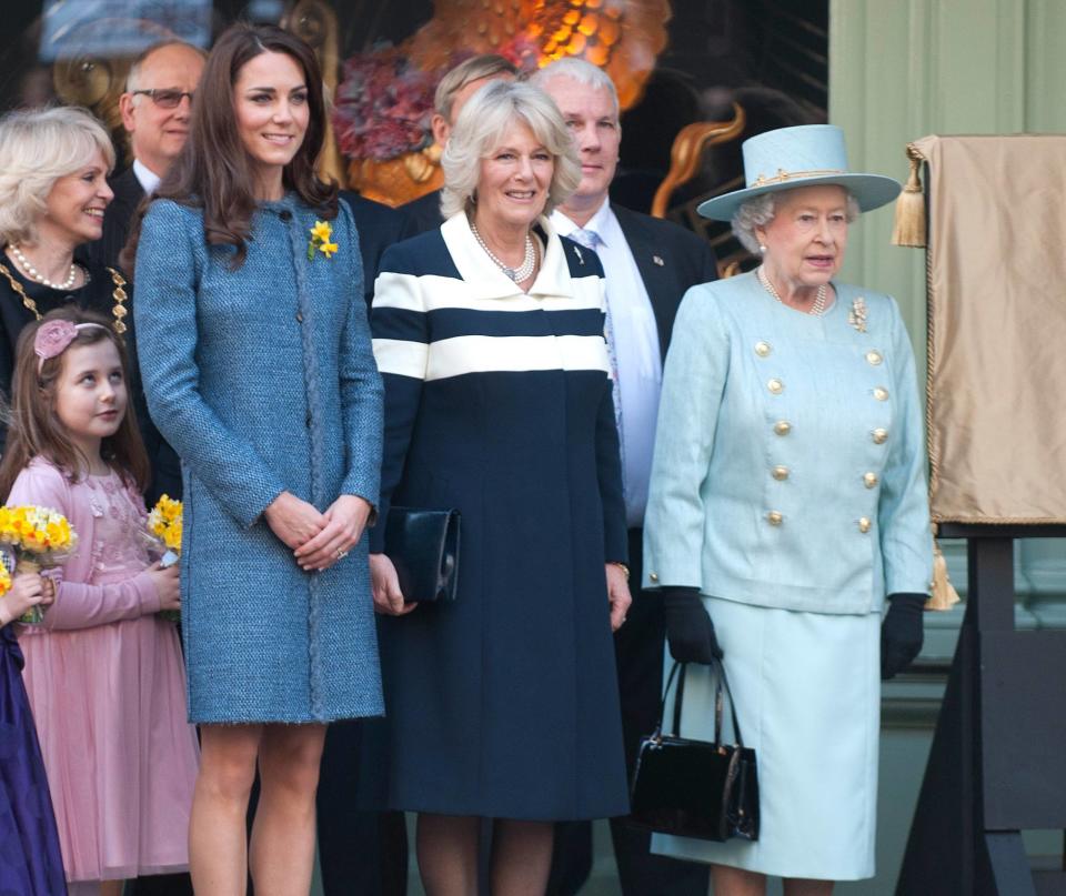 Queen Elizabeth II, Camilla, Duchess of Cornwall and Catherine, Duchess of Cambridge, aka Kate Middleton, unveiling a plaque at Fortnum & Mason during the Queen's Diamond Jubilee year to commemorate the resotration of Piccadilly, before heading inside for a tour of the department store. London, England - 01.03.12 **Not Available for Publication in France. Available for Publication in the Rest of the World** Credit Mandatory: Zak Hussein/WENN.com