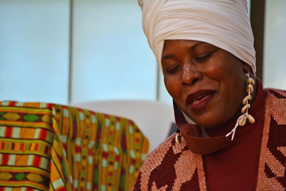 Marshanette Densmore sings Saturday in the closing song of the Kwanzaa celebration held at the Columbia Parks and Recreation Armory Sports and Recreation Center that also featured a Black-owned business expo and a holiday feast.