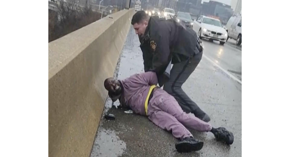 FILE - In this frame grab from cellphone video provided by Celena Morrison, her husband, Darius McLean, is handcuffed by a state trooper during a traffic stop, in Philadelphia, March 2, 2024. The state trooper is no longer employed by the Pennsylvania state police, officials said Friday, May 10, 2024. (Celena Morrison via AP, File)